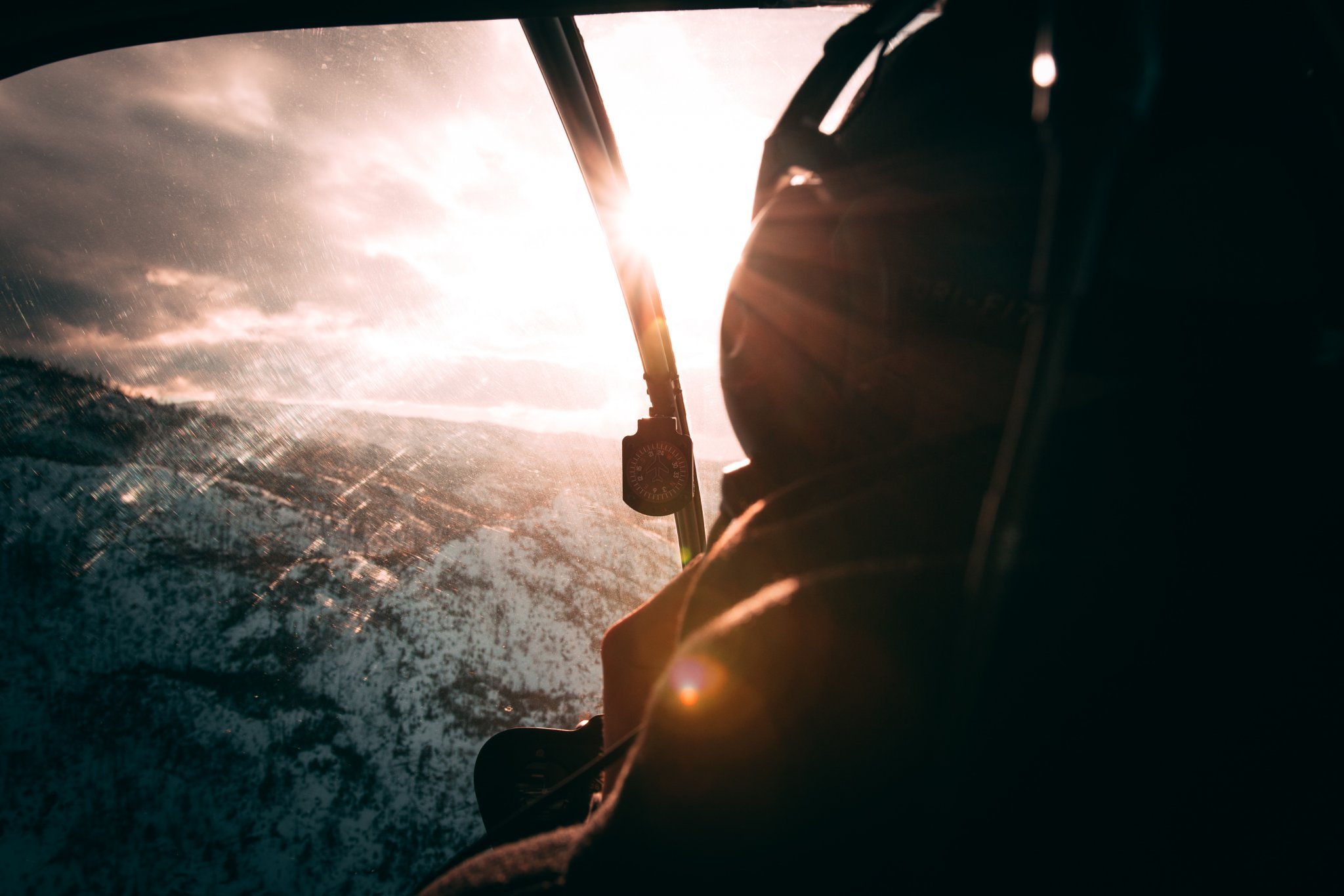 Hiilite | Marketing, SEO, Branding, Web & Graphic Design A helicopter in Kelowna, British Columbia navigating the skies in the early morning assessing the risk